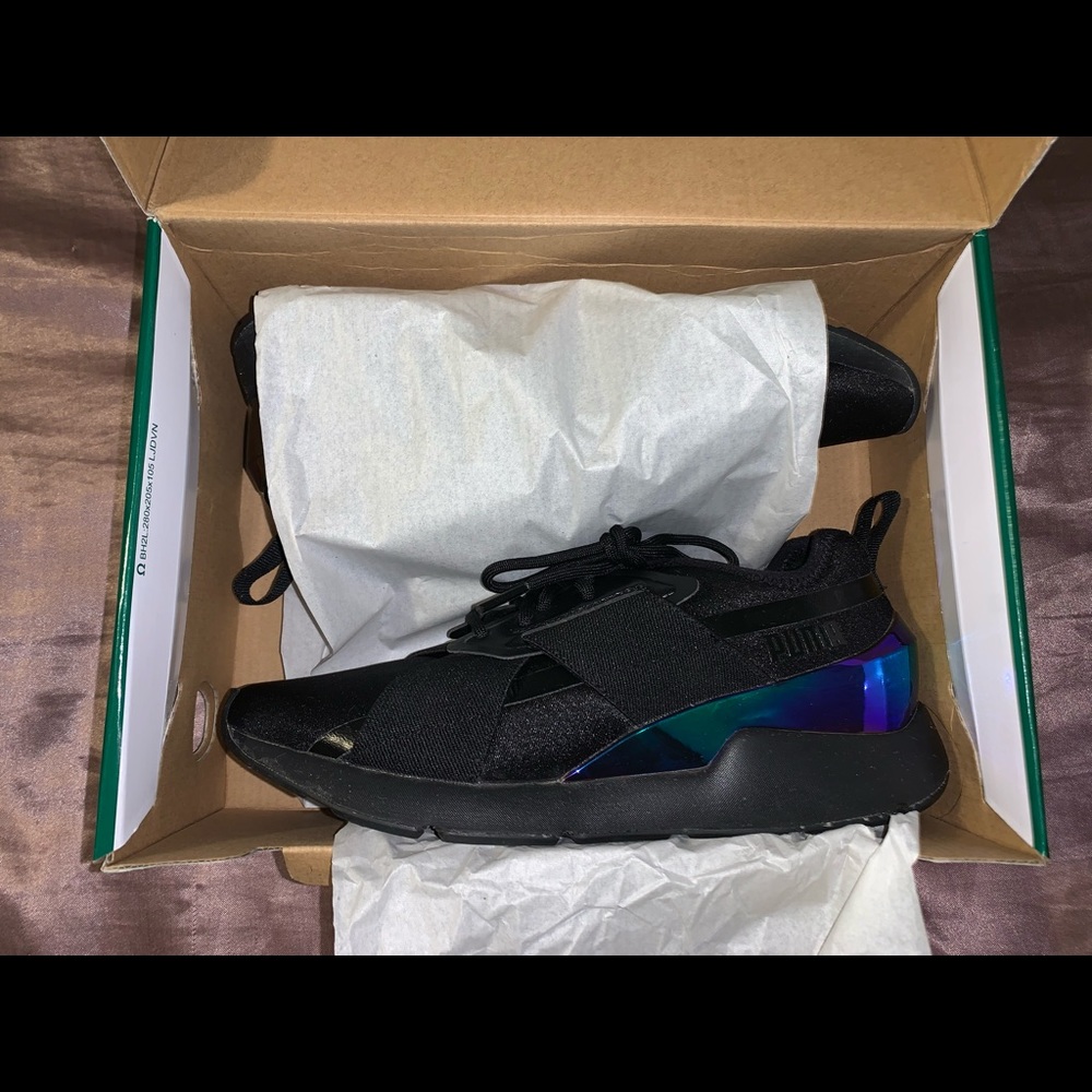 Black and iridescent Puma athletic shoes